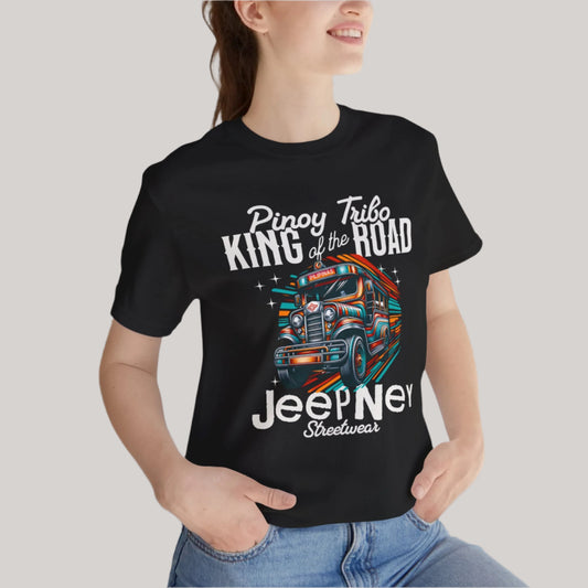 T-shirt featuring a colorful jeepney with 'King of the Road' text, part of PINOY TRIBO™'s Filipino-inspired apparel collection.