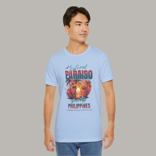 Paraiso Philippines Graphic Tee featuring a tropical sunset, palm trees, and ocean waves, celebrating the natural beauty of the Philippines and Filipino island life.