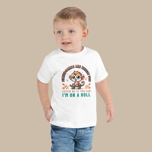 Toddler tee design featuring a cartoon tarsier riding a skateboard with playful text that reads “Skateboards Are Wheely Fun” and “Catch Me If You Can, I'm On a Roll,” celebrating Filipino culture and youthful energy.