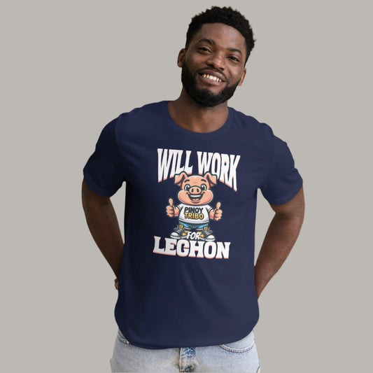 A fun and playful "Will Work for Lechon" graphic tee featuring a cartoon pig mascot wearing a "Pinoy Tribo" shirt, sneakers, and giving thumbs-up, with bold text celebrating Filipino food culture.