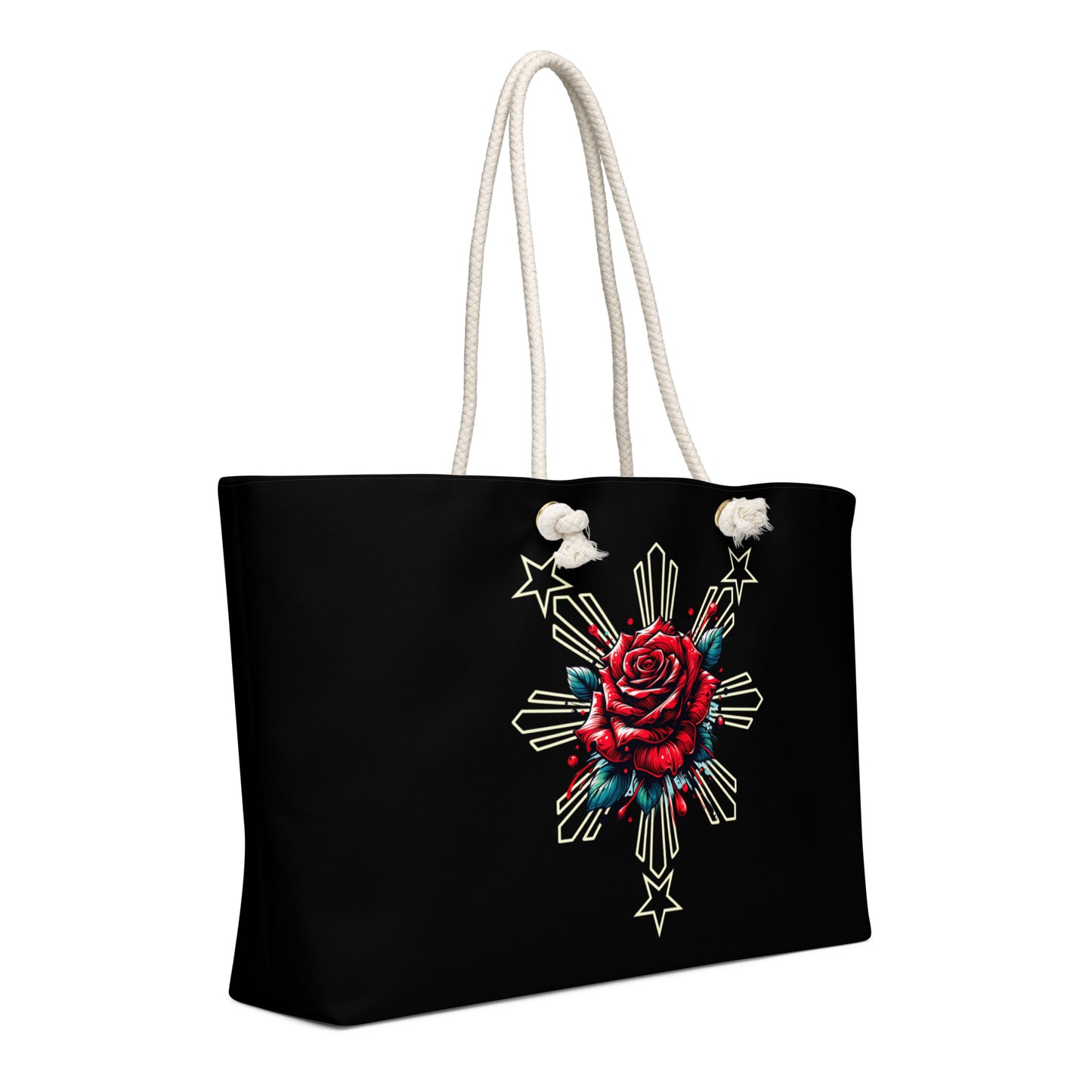 Weekender bag with a rose and sunburst three-star Filipino design on a black background with rope handles.