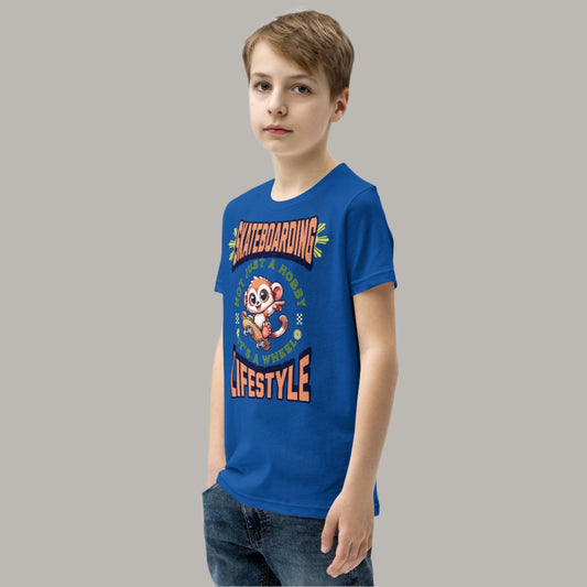 Cute cartoon Philippine tarsier riding a skateboard with the text “Skateboarding Not Just a Hobby, It’s a Wheel Lifestyle” on a youth t-shirt design.