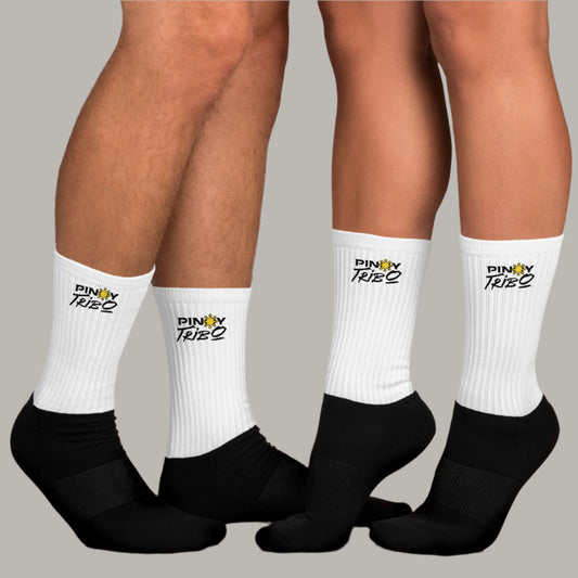 Crew-length socks with ribbed upper and cushioned sole, featuring a sublimation-printed PINOY TRIBO™ logo on the leg portion.