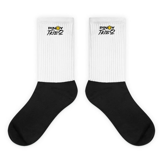 Crew-length socks with ribbed upper and cushioned sole, featuring a sublimation-printed PINOY TRIBO™ logo on the leg portion.