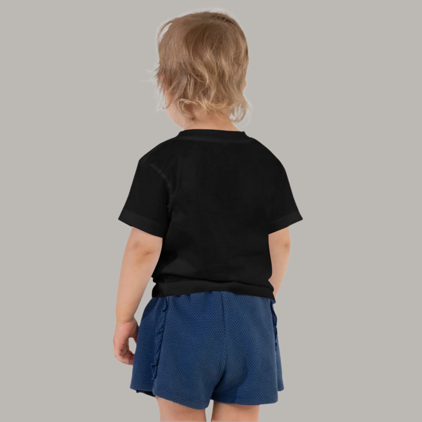 Toddler tee featuring bold text that reads “ate” in a vintage typewriter-style font, representing Filipino culture and identity.