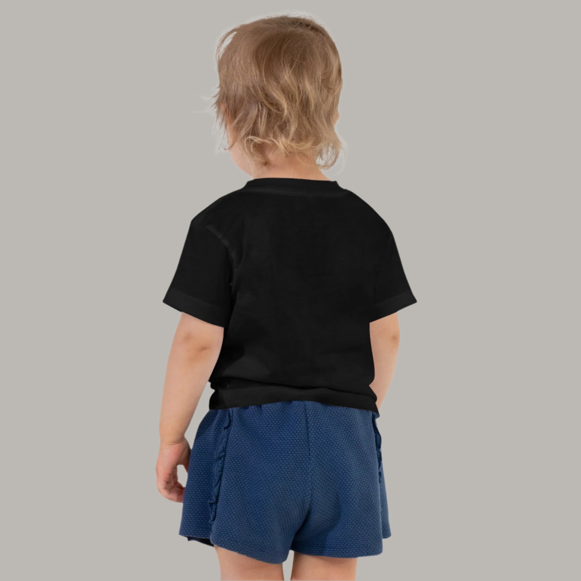 Toddler tee featuring bold text that reads “ate” in a vintage typewriter-style font, representing Filipino culture and identity.