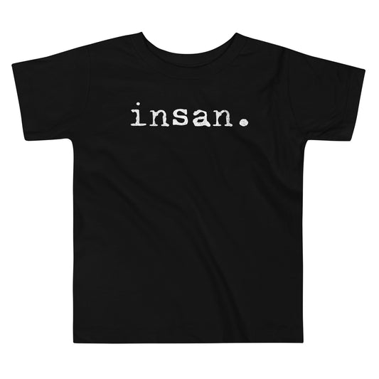 Toddler tee design with bold text reading “insan.” in a grunge typewriter-style font, representing the Filipino word for cousin.