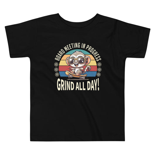 Toddler tee design featuring a cartoon tarsier wearing sunglasses on a skateboard with retro stripes and the phrases “Board Meeting in Progress” and “Grind All Day,” blending skater style with Filipino fun.