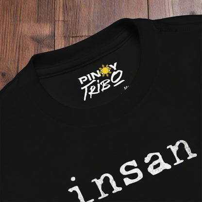 Toddler tee design with bold text reading “insan.” in a grunge typewriter-style font, representing the Filipino word for cousin.