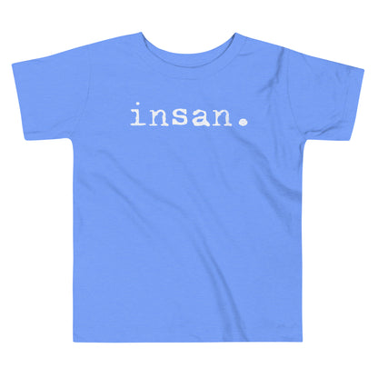 Toddler tee design with bold text reading “insan.” in a grunge typewriter-style font, representing the Filipino word for cousin.