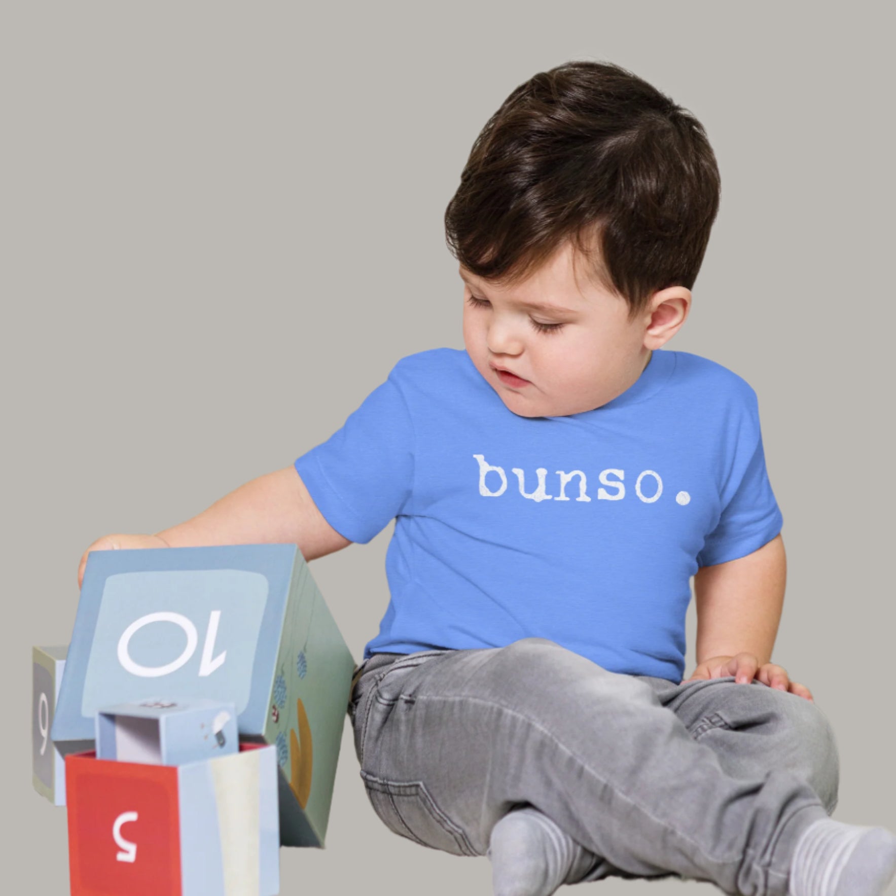 Toddler tee with white typewriter-style text that reads “bunso.” representing the Filipino term for the youngest sibling.