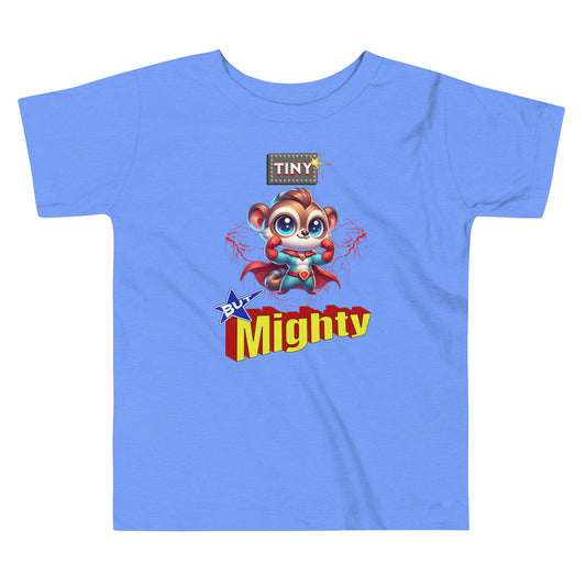 Toddler tee design featuring a superhero tarsier named Taro in a red cape with the bold phrase “Tiny But Mighty,” accented by lightning bolts and power-themed elements.