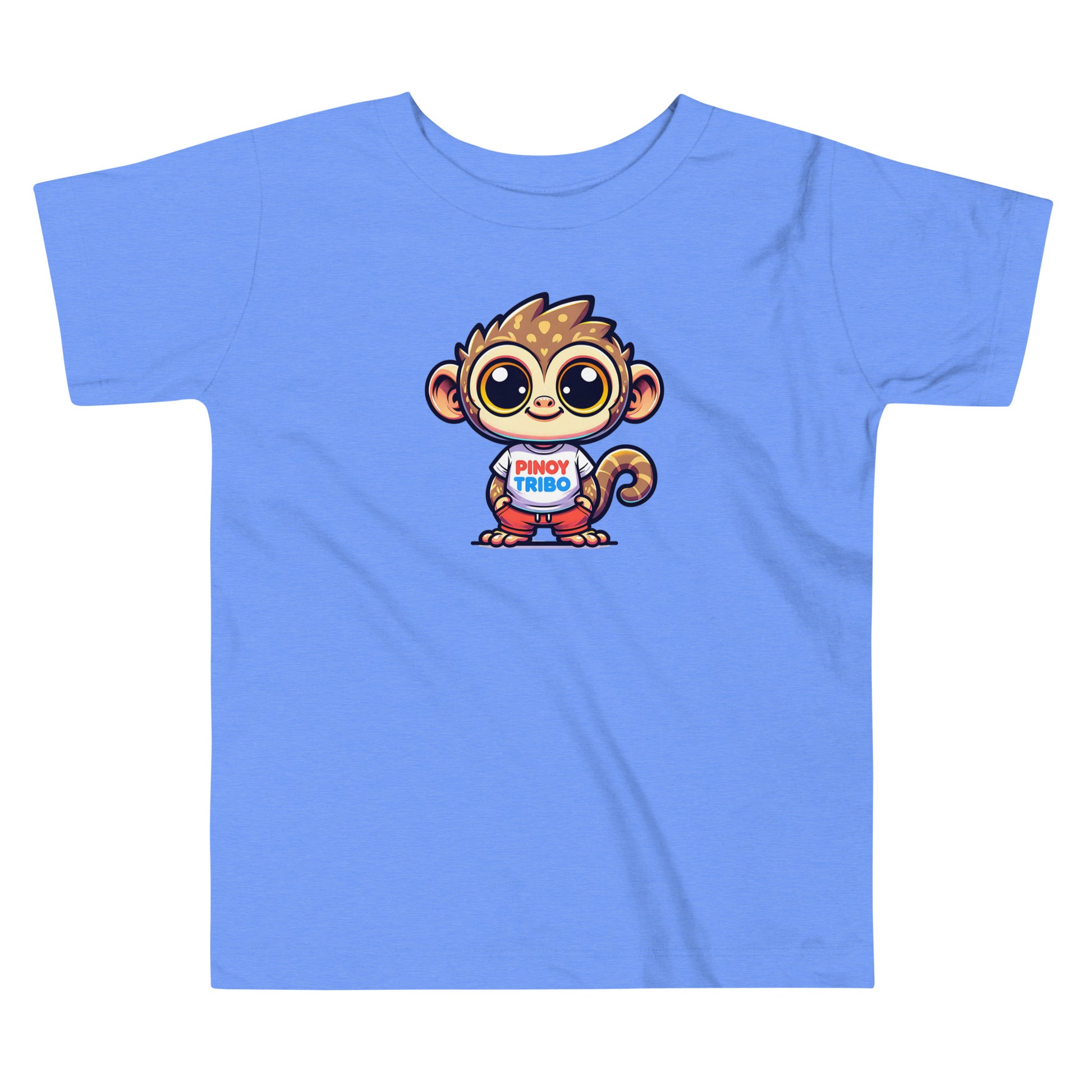 Toddler tee design featuring a cartoon tarsier character wearing a shirt with the words “Pinoy Tribo” in red and blue text, celebrating Filipino identity and youth style.