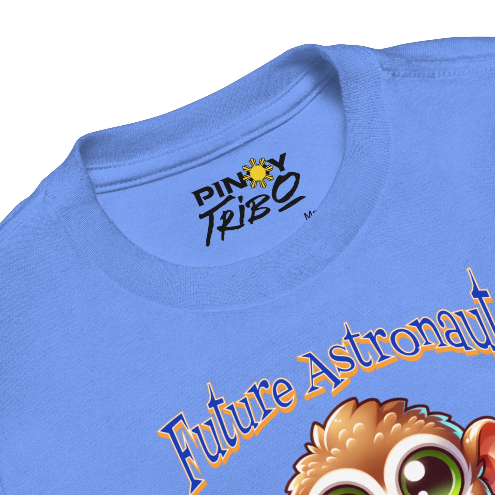 Toddler tee design featuring a cartoon tarsier holding an ice cream cone with playful text that reads “Future Astronaut or Ice Cream Tester,” celebrating Filipino culture and childhood imagination.