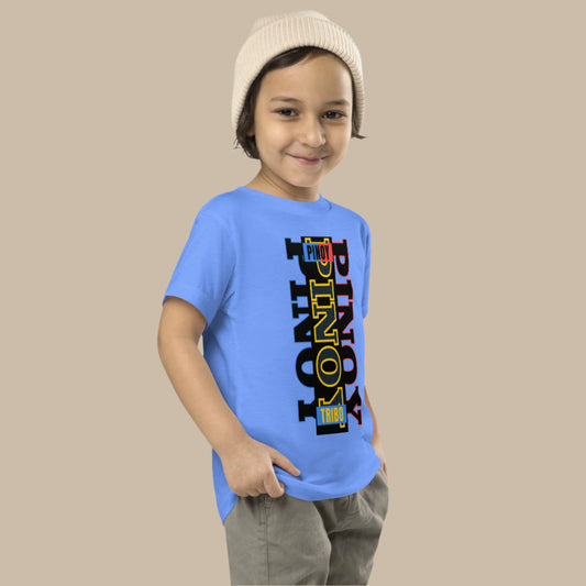 Toddler tee design with bold vertical text spelling “PINOY” in red, yellow, and blue with block-style accents, inspired by the Philippine flag.