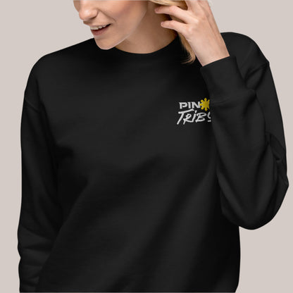 PINOY TRIBO™ logo with bold white text and the iconic yellow Philippine sun, embroidered on a cozy ultra-soft crewneck sweatshirt, perfect for showcasing Filipino pride.