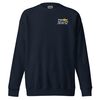 PINOY TRIBO™ logo with bold white text and the iconic yellow Philippine sun, embroidered on a cozy ultra-soft crewneck sweatshirt, perfect for showcasing Filipino pride.