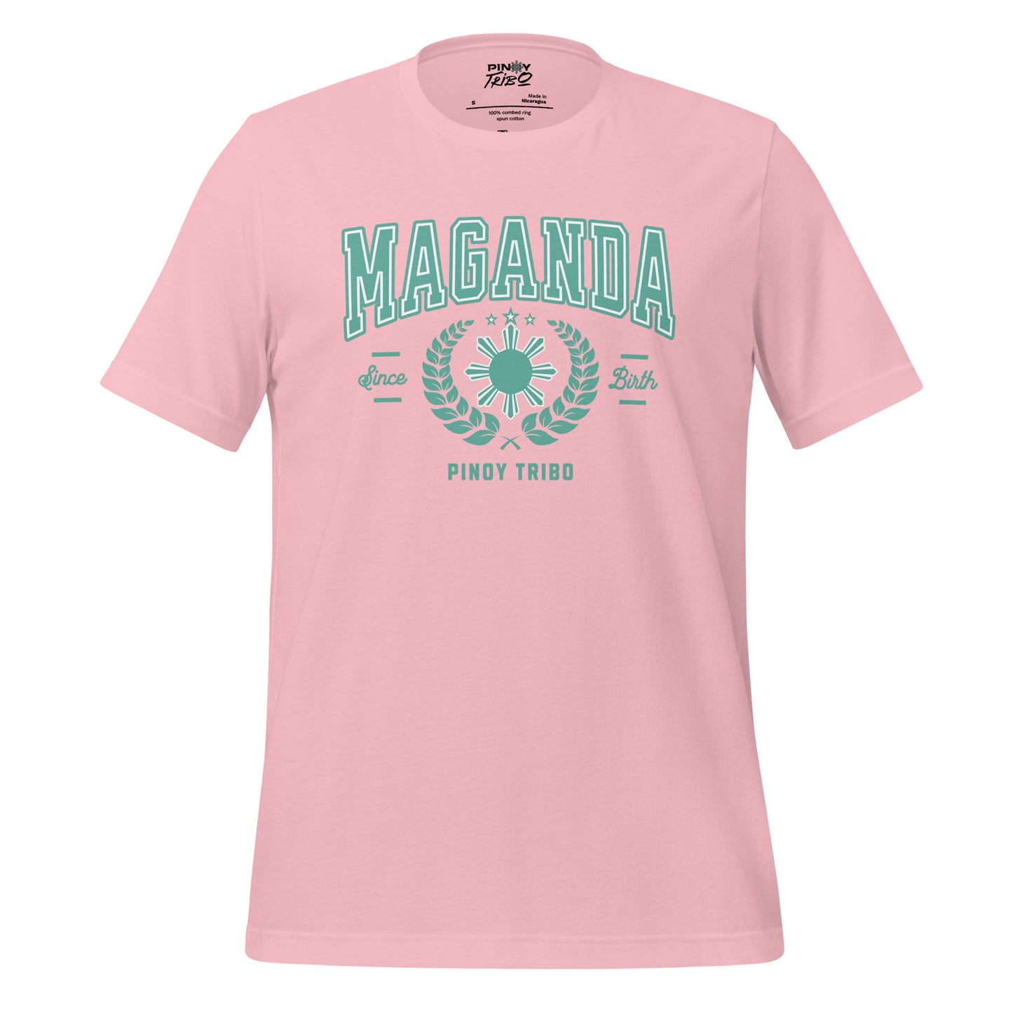 A "Maganda Since Birth" graphic tee featuring bold varsity-style lettering, laurel wreaths, and the Philippine sun and stars design, celebrating Filipino pride and beauty.