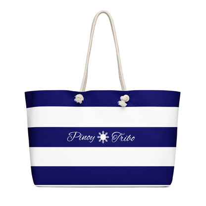 Weekender bag with navy and white stripes, Pinoy Tribo logo at the center, and rope handles.