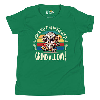 Cute cartoon Philippine tarsier wearing sunglasses, riding a skateboard with a retro striped background and the text “Board Meeting in Progress” and “Grind All Day!” on a youth t-shirt design.