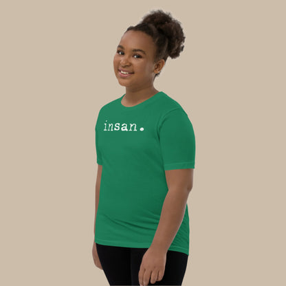 Minimalist white text “insan.” in a typewriter-style font on a youth t-shirt design.