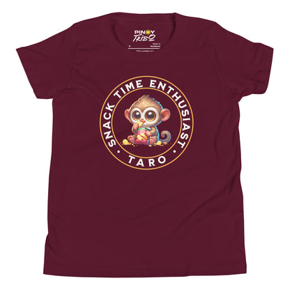 Cute cartoon Philippine tarsier named Taro eating chips with “Snack Time Enthusiast” text in a circular badge on a youth t-shirt design.