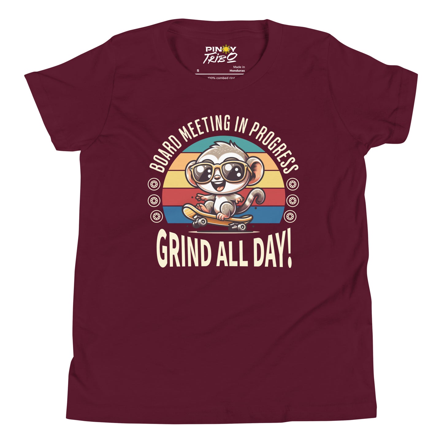 Cute cartoon Philippine tarsier wearing sunglasses, riding a skateboard with a retro striped background and the text “Board Meeting in Progress” and “Grind All Day!” on a youth t-shirt design.