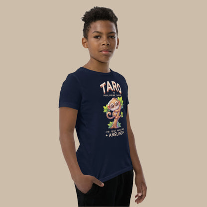Cartoon Philippine tarsier named Taro hanging on a tree with “I’m just hanging around” text, featured on a Filipino youth t-shirt design.